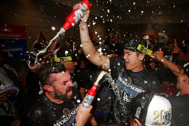 Los Angeles Dodgers two-way player Shohei Ohtani celebrates in the locker room after the Los Angeles Dodgers beat the New York Yankees in game four to win the 2024 MLB World Series at Yankee Stadium on October 31, 2024. (Photo by Brad Penner/Reuters)