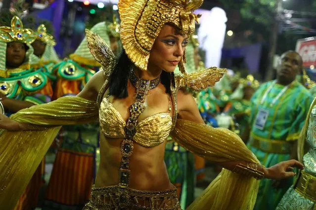 A reveller of Grande Rio samba school performs during the first night of the Carnival parade at the Sambadrome in Rio de Janeiro, Brazil on February 24, 2020. (Photo by Pilar Olivares/Reuters)