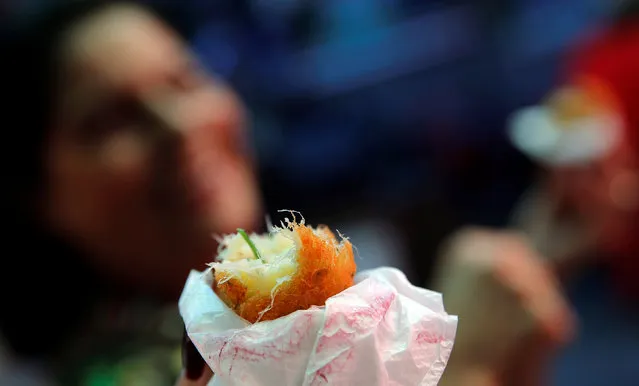 A view of traditional bolinhos de bacalhau (fried codfish balls) in Rio de Janeiro, Brazil, May 7, 2016. (Photo by Sergio Moraes/Reuters)