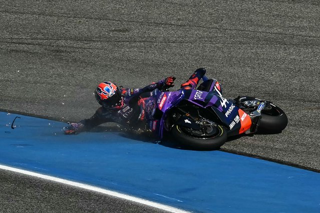 Prima Pramac Yamaha's Australian rider Jack Miller crashes during the practice session of the MotoGP Thailand Grand Prix at the Buriram International Circuit in Buriram on February 28, 2025. (Photo by Mohd Rasfan/AFP Photo)