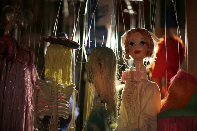 Marionettes backstage before a performance at the Bob Baker Marionette Theater in Los Angeles, California October 17, 2014. (Photo by Lucy Nicholson/Reuters)