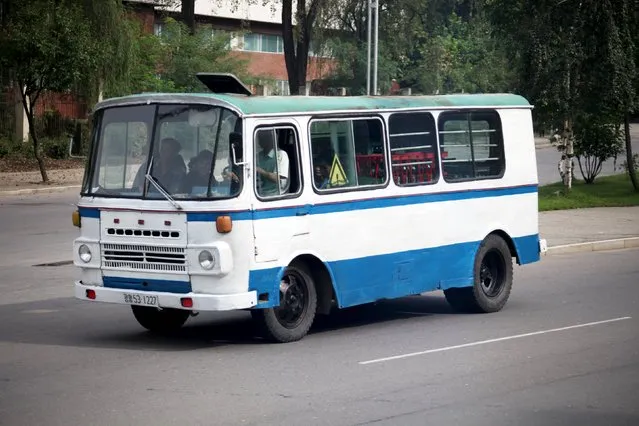 A bus travels in Pyongyang, North Korea, in this September 6, 2010 handout. It's not Amazon or FedEx, but in North Korea's fledgling market economy a fleet of repurposed old passenger buses is the next best thing for moving trade goods, from rice to textiles and livestock, between far-flung corners of the country. (Photo by Roman Harak/Reuters)