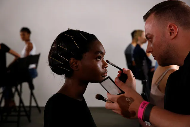 A model has make up applied backstage before The Blonds Spring/Summer 2017 collection during New York Fashion Week in the Manhattan borough of New York, U.S., September 11, 2016. (Photo by Lucas Jackson/Reuters)