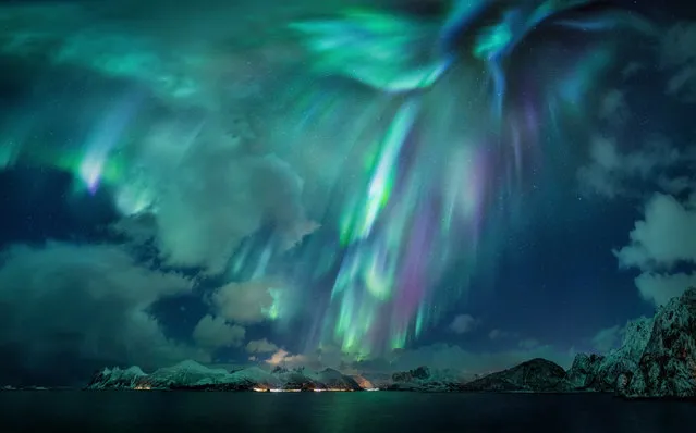 Aurorae category winner: The Green Lady by Nicholas Roemmelt (Germany). The photographer had heard a lot of stories about the “lady in green”. Although he has had the chance to photograph the northern lights many times, he had never seen the green lady before. On a journey to Norway, she unexpectedly appeared with her magical green clothes, making the whole sky burn with green, blue and pink hues. (Photo by Nicholas Roemmelt/2020 Astronomy Photographer of the Year)