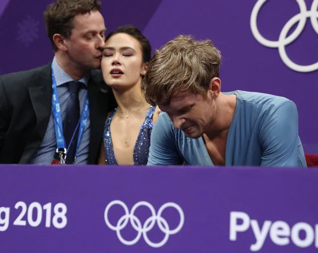 USA' s Madison Chock and USA' s Evan Bates react after competing in the ice dance free dance of the figure skating event during the Pyeongchang 2018 Winter Olympic Games at the Gangneung Ice Arena in Gangneung on February 20, 2018. (Photo by John Sibley/Reuters)