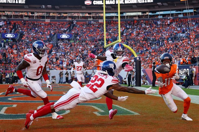 Denver Broncos wide receiver Troy Franklin, right, catches a touchdown pass during the Broncos’ comeback win over the New York Giants on Sunday, October 19, 2025. The Broncos overturned a 19-point fourth-quarter deficit to win 33-32. They scored all 33 of their points in the fourth quarter. (Photo by Matthew Stockman/Getty Images)