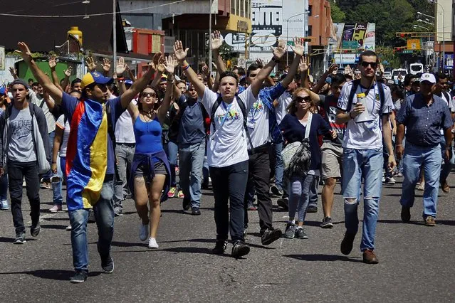 Demonstrators shout slogans during a rally demanding a referendum to remove Venezuela's President Nicolas Maduro in San Cristobal, Venezuela November 3, 2016. (Photo by Carlos Eduardo Ramirez/Reuters)