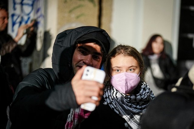Greta Thunberg (R), Swedish activist, takes part in a pro-Palestinian rally under the slogan “Solidarity with Palestine” on the anniversary of the Hamas attack on Israel at Südstern in Berlin-Kreuzberg on October 7, 2024. (Photo by Kay Nietfeld/dpa)