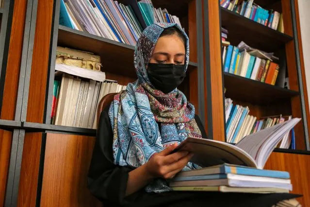 Zahra, a 16-year-old 10th grade student, studies at her home as she marks the second anniversary of ban on girls going to higher secondary schools, in Kabul, Afghanistan, 18 September 2023. Zahra expressed her increasing frustration with the closure of schools due to the Taliban banning higher grade education for girls. She reveals her hope of one day being able to wear her school clothes again, as she has kept them for over two years. Despite the Taliban's third year in power, girls like Zahra continue to wait for school gates to open. The Taliban's ban on girls' education in Afghanistan has had a significant impact on over 1.1 million girls and young women. With secondary and university education suspended, many girls have resorted to attending religious schools as their only option. International pressure for girls' education and the Taliban's legitimacy crisis further complicate the situation, as the group faces diplomatic pressure and isolation. (Photo by Samiullah Popal/EPA/EFE)