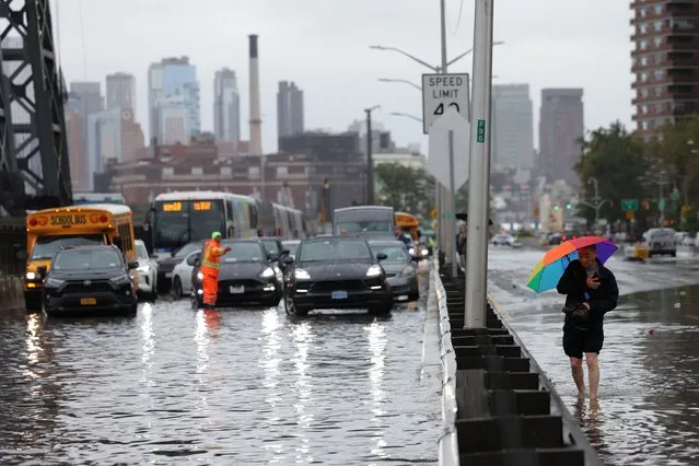 Cars sit at a standstill at the FDR Drive after heavy rains as the remnants of Tropical Storm Ophelia bring flooding across the mid-Atlantic and Northeast, in New York City, U.S., September 29, 2023. (Photo by Andrew Kelly/Reuters)