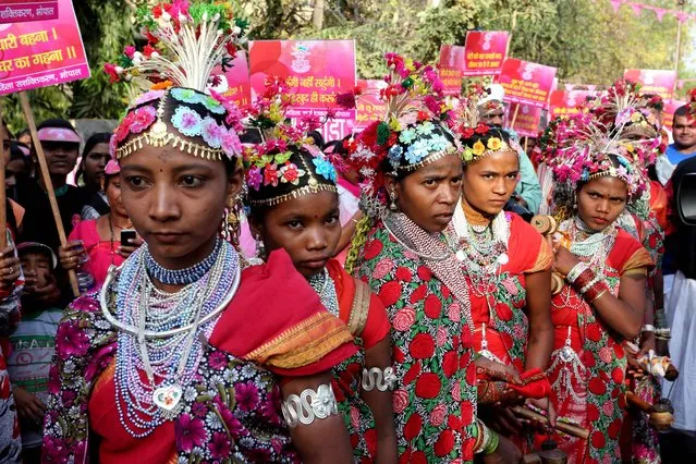 Indian tribal artists during a rally for International Women's Day in Bhopal, India, 08 March 2016. The rally was organized by the Womens and Childrens Development Department of the government of Madhya Pradesh. International Women's Day is celebrated globally to promote women's rights and equality. (Photo by Sanjeev Gupta/EPA)