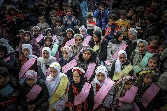 A ceremony is held for 40 students who memorized parts of the Holy Quran at the Shafa Amr School which is used as a shelter for displaced people in Rafah, Gaza on February 14, 2024. (Photo by Belal Khaled/Anadolu via Getty Images)