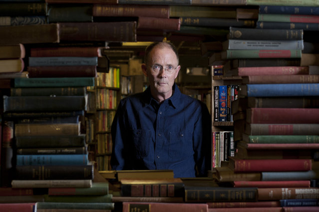 Author William Gibson poses for a portrait at the Last Bookstore in Los Angeles, Wednesday Sept. 5, 2012. (Jason Redmond photo)