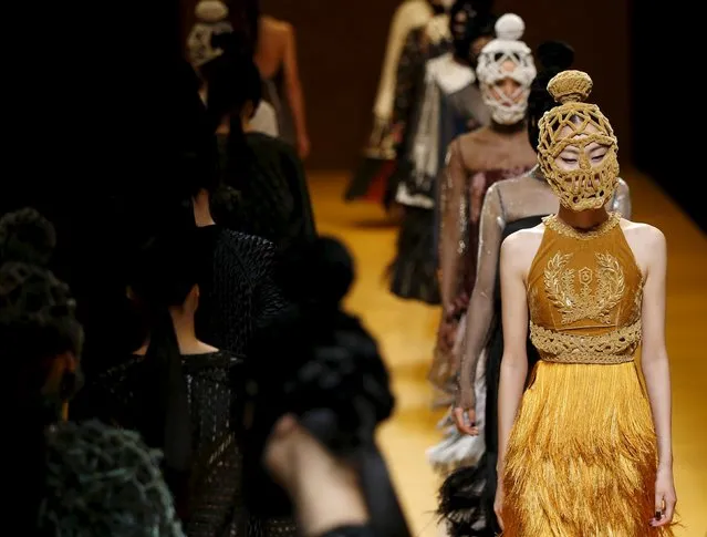 Models present a creations by Vietnamese designer Nguyen Cong Tri from his Autumn/Winter 2016 collection during Tokyo Fashion Week in Tokyo, Japan, March 15, 2016. (Photo by Issei Kato/Reuters)