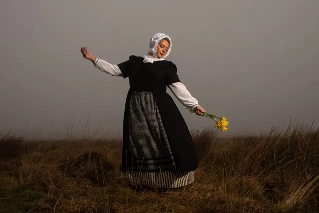Dancers from Dawnswyr Tawerin, the Welsh folk dance society, wearing traditional Welsh woollen costumes, took part in preparations for St David’s Day celebrations at Black Mountain in Ammanford, UK in the last decade of February 2024. (Photo by Joann Randles/Cover Images)