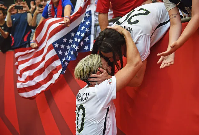 Abby Wambach of USA celebrates with her wife Sarah Huffman after winning the FIFA Women's World Cup Final between USA and Japan at BC Place Stadium on July 5, 2015 in Vancouver, Canada. (Photo by Stuart Franklin – FIFA/FIFA via Getty Images)