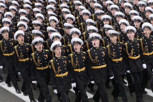 Russian Navy cadets march during a rehearsal for the Victory Day military parade at Dvortsovaya (Palace) Square in St. Petersburg, Russia, Sunday, May 5, 2024. The parade will take place at St. Petersburg's Palace Square on May 9 to celebrate 79 years since the victory in WWII. (Photo by Dmitri Lovetsky/AP Photo)
