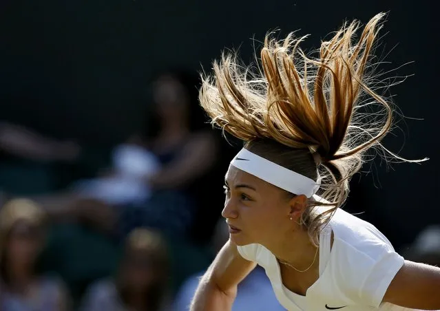 Aleksandra Krunic of Serbia serves during her match against Venus Williams of the U.S.A. at the Wimbledon Tennis Championships in London, July 3, 2015. (Photo by Stefan Wermuth/Reuters)