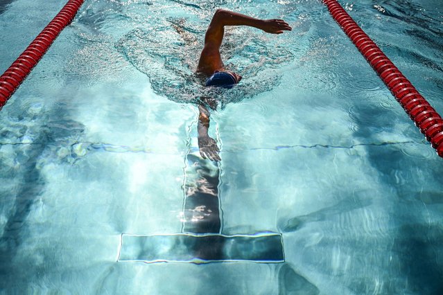 French swimmer Leon Marchand takes part in a France swimming team's training session in the Aquatic Stadium swimming pool in Bellerive-sur-Allier near Vichy, on July 17, 2024, ahead of the Paris 2024 Olympic Games. (Photo by Olivier Chassignole/AFP Photo)