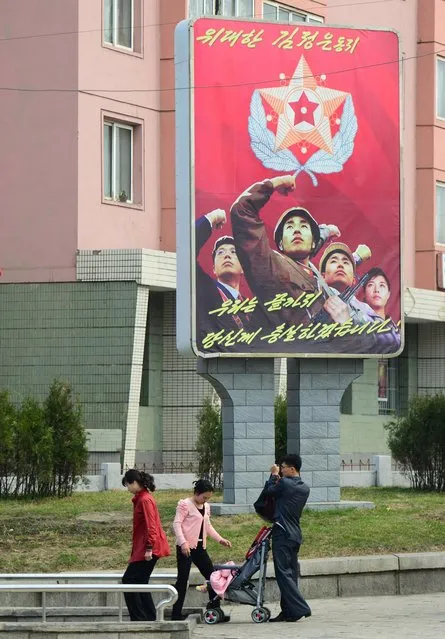 A common sight around Pyongyang were the numerous ‘patriotic posters’ which carry socialist and militaristic images. (Photo by Gavin John/Mediadrumworld.com)