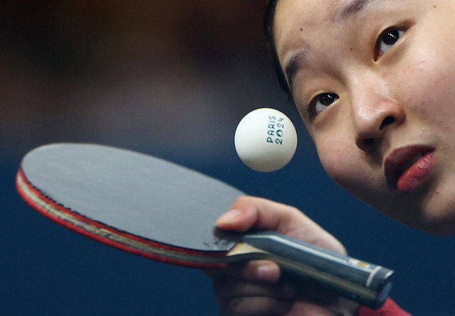 Japan's Miwa Harimoto returns the ball during her women's table tennis singles match in the team gold medal match between China and Japan at the Paris 2024 Olympic Games at the South Paris Arena in Paris on August 10, 2024. (Photo by Kim Hong-Ji/Reuters)