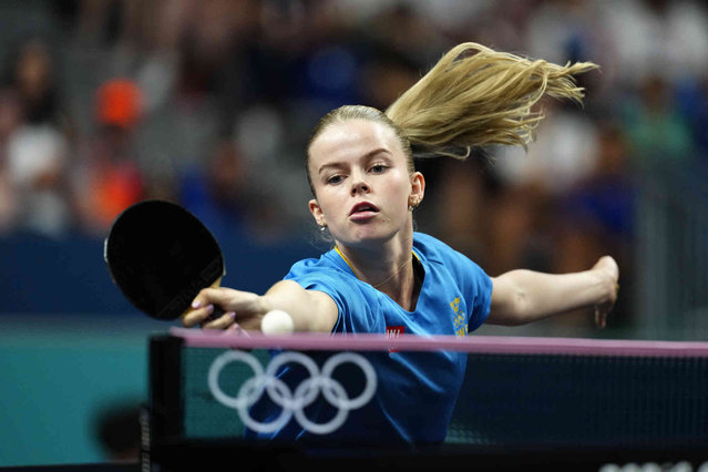 Sweden's Filippa Bergand plays against Hong Kong's Zhu Chengzhu during a women's teams round of 16 table tennis match at the 2024 Summer Olympics, Monday, August 5, 2024, in Paris, France. (Photo by Petros Giannakouris/AP Photo)