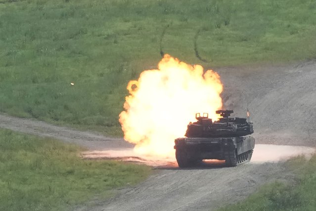 A U.S. Army's M1A2 Abrams tank from the 1st Armored Brigade Combat Team fires during a live firing drill at Rodriguez Live Fire Complex in Pocheon, South Korea, Wednesday, August 14, 2024. (Photo by Ahn Young-joon/AP Photo)