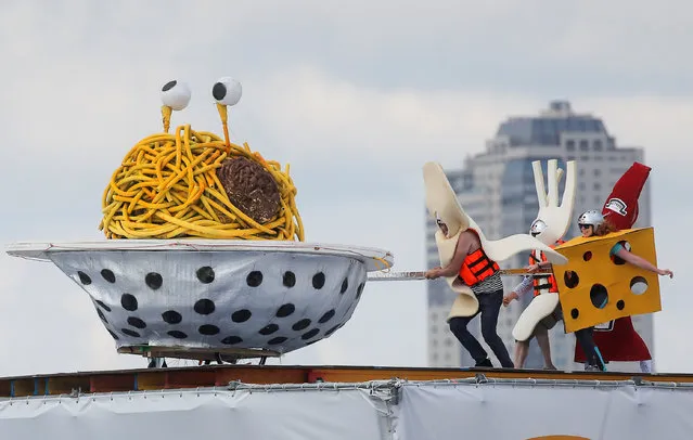 Participants from the Pastafarians team perform during the Red Bull Flugtag Russia 2019 competition in Moscow, Russia, July 28, 2019. (Photo by Maxim Shemetov/Reuters)