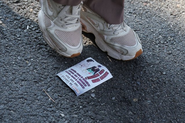 A view of a North Korean propaganda leaflet denouncing South Korean President Yoon Suk Yeol and his wife Kim Keon Hee, apparently carried by balloons sent from North Korea, near the Presidential Office in Seoul, South Korea, on October 24, 2024. (Photo by Kim Hong-Ji/Reuters)