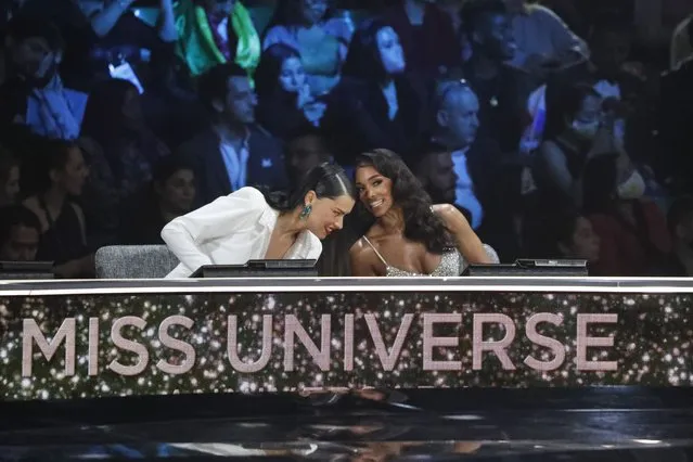 Judges Adriana Lima, left, and Lori Harvey take part in the 70th Miss Universe pageant, Monday, December 13, 2021, in Eilat, Israel. (Photo by Ariel Schalit/AP Photo)