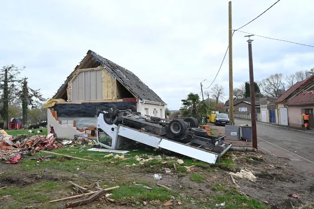 This photograph taken on November 7, 2022 shows a house and a car damaged by tornado in Bihucourt, northern France, after a tornado hit the region on October 23, 2022. (Photo by Francois Lo Presti/AFP Photo)