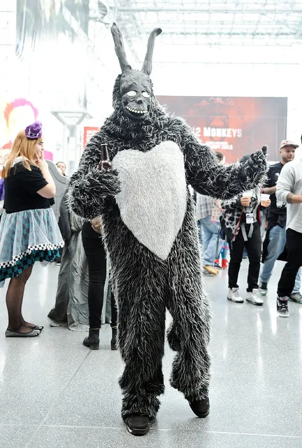 A Comic Con attendee poses as a Frank from Donnie Darko during the 2014 New York Comic Con at Jacob Javitz Center on October 9, 2014 in New York City. (Photo by Daniel Zuchnik/Getty Images)