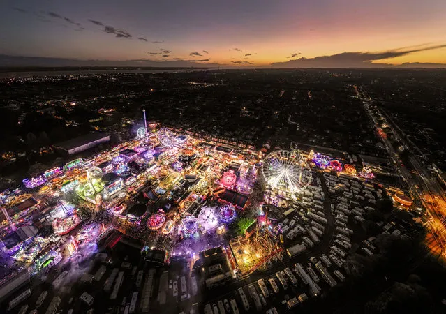 The opening night of the Hull Fair 2022 in Yorkshire on Friday, October 7, 2022 – one of the largest travelling fairs in Europe, which features over 250 rides. The fair features an array of rides alongside traditional attractions such as palm reading and stalls packed with food, treats and games. (Photo by Danny Lawson/PA Images via Getty Images)