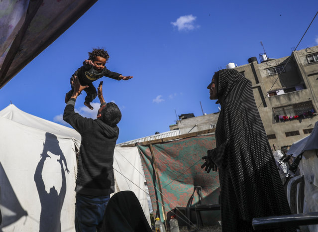 36-year-old Palestinian Mohammad Bakrun and his family, living in a makeshift tent set up on roadside, try to maintain their daily lives despite difficult conditions, in Gaza City, Gaza on April 05, 2025. (Photo by Mahmoud ssa/Anadolu via Getty Images)