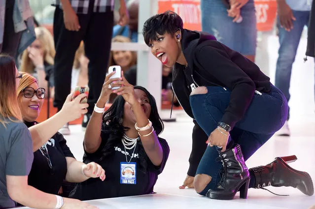 Jennifer Hudson poses for a selfie with fans while performing on NBC's “Today” at Rockefeller Plaza on August 19, 2014 in New York City. (Photo by D. Dipasupil/FilmMagic)
