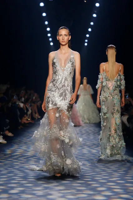 Models present creations from the Marchesa Spring/Summer 2017 collection during New York Fashion Week in the Manhattan borough of New York, U.S., September 14, 2016. (Photo by Lucas Jackson/Reuters)