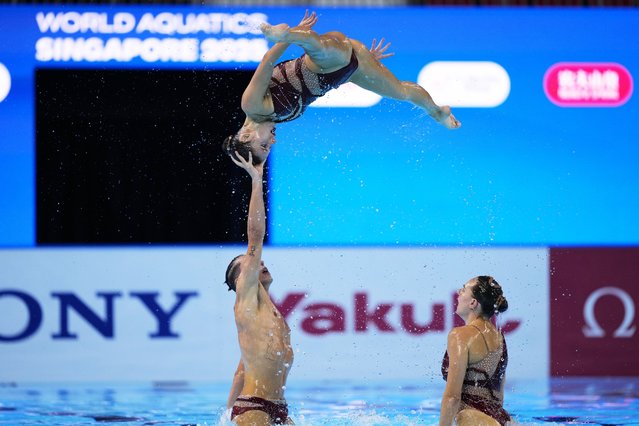 Team Spain compete in the team free final of artistic swimming at the World Aquatics Championships in Singapore, Sunday, July 20, 2025. (Photo by Vincent Thian/AP Photo)