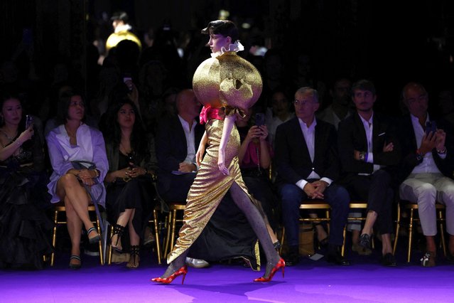 A model presents a creation by designers Viktor Horsting and Rolf Snoeren as part of their Haute Couture Fall/Winter 2024-2025 collection show for fashion house Viktor & Rolf in Paris, France, on June 26, 2024. (Photo by Stephanie Lecocq/Reuters)