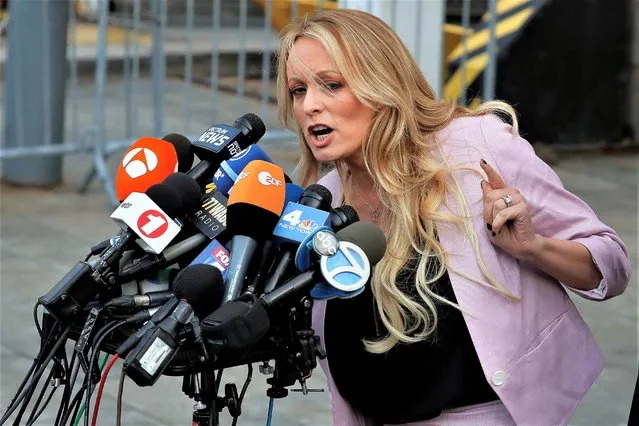 Adult-film actress Stephanie Clifford, also known as Stormy Daniels, speaks as she departs federal court in the Manhattan borough of New York City, New York, U.S., April 16, 2018. (Photo by Lucas Jackson/Reuters)