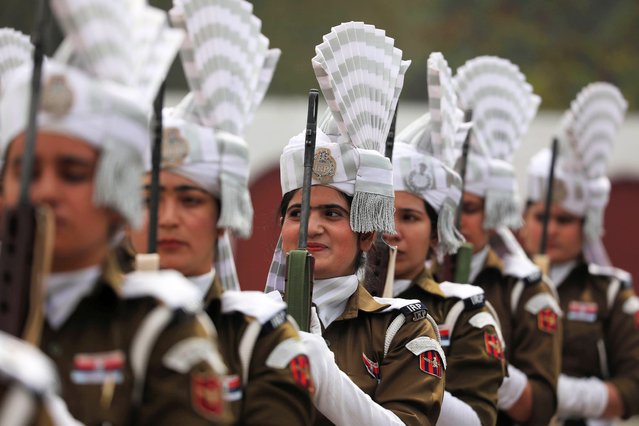 Members of the Jammu and Kashmir Police women pay tribute during a ceremony to mark Police Commemoration Day at the Police Training Centre in Zewan, on the outskirts of Srinagar, the summer capital of Indian Kashmir, 21 October 2025. The annual Police Commemoration Day is observed on 21 October to remember and honor policemen and security personnel killed across India. (Photo by Farooq Khan/EPA)