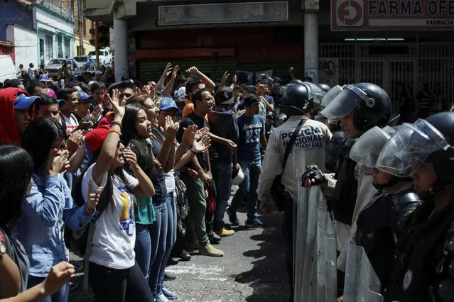 Demonstrators shout slogans in front of riot police during a rally demanding a referendum to remove Venezuela's President Nicolas Maduro in San Cristobal, Venezuela November 3, 2016. (Photo by Carlos Eduardo Ramirez/Reuters)