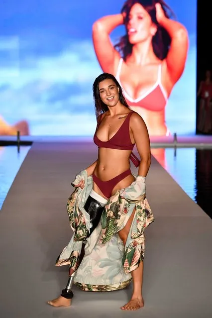 Paralympian snowboarder Brenna Huckaby walks the runway for the swimsuit show during the Paraiso Fashion Fair in Miami at the W South Beach hotel on July 15, 2018. (Photo by Alexander Tamargo/Getty Images for Sports Illustrated)