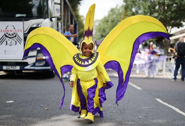 A child wears a costume, as they take part in the Children's Day Parade, during Notting Hill Carnival, in London, Britain on August 27, 2023. (Photo by Hollie Adams/Reuters)