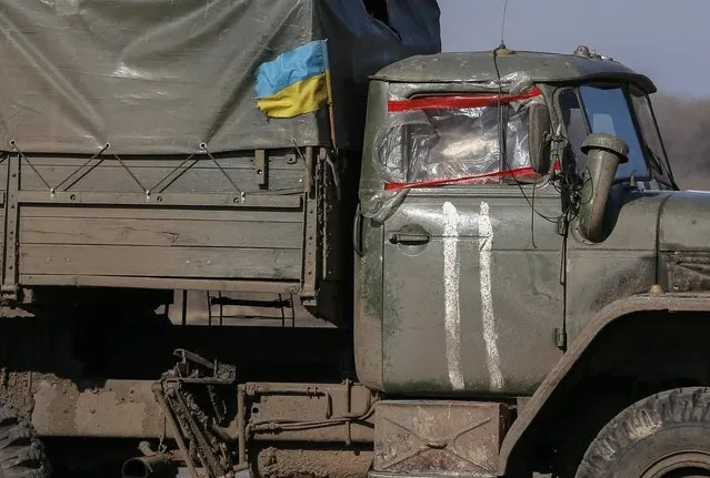 A military vehicle of the Ukrainian armed forces is seen near Artemivsk, eastern Ukraine, February 21, 2015.    REUTERS/Gleb Garanich  (UKRAINE - Tags: POLITICS CIVIL UNREST TRANSPORT MILITARY CONFLICT)
