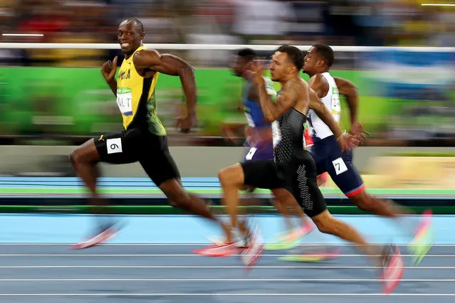 Silver Award. The Smile (2016). Usain Bolt of Jamaica competes in the men’s 100m semi-final at the Rio Olympics. (Photo by Cameron Spencer/World Sports Photography Awards 2021)