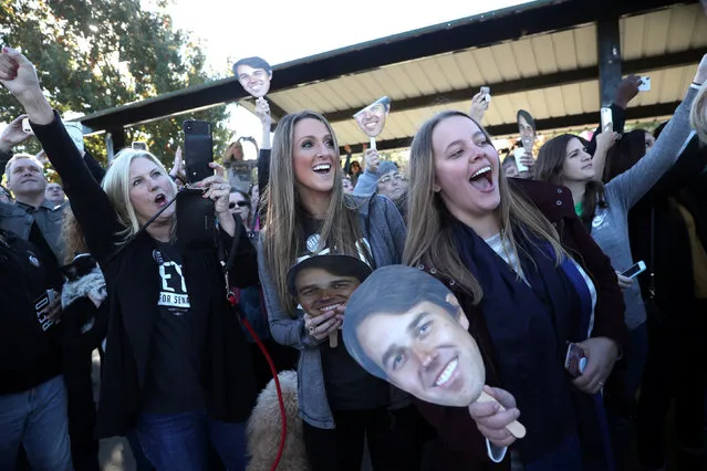 Supporters of U.S. Rep. Beto O'Rourke (D-TX), candidate for U.S. Senate Cheer as he arrives at a campaign rally in Lewisville, Texas, U.S., November 2, 2018. (Photo by Mike Segar/Reuters)