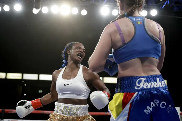 Claressa Shields, left, swings at Belgium's Femke Hermans, during their WBC/IBF/WBA middleweight title boxing match, Saturday, December 8, 2018, in Carson, Calif. (Photo by Chris Carlson/AP Photo)