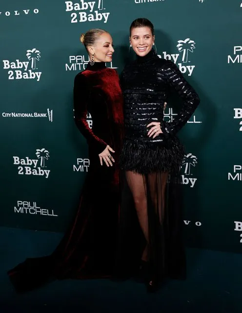 US television personality Nicole Richie (L) and sister US model Sofia Richie arrive for the 2023 Baby2Baby Gala in Los Angeles, California, on November 11, 2023. (Photo by Michael Tran/AFP Photo)
