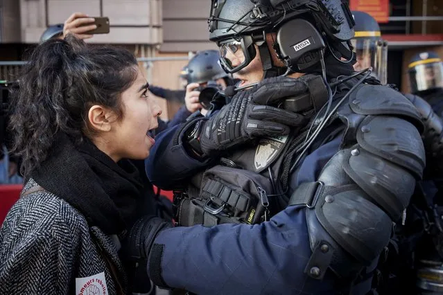 An angry protestor confronts French Riot Police after peaceful demonstrations, which were part of National General Strike along the Rue de Rivoli, turned violent on February 05, 2019 in Paris, France. The strike, led by the CGT Union, with four other unions also taking part, is in answer to President Macron’s Great National Debate and calls for a rise in the national minimum wage and for fair taxation, claims also held by the Gilets Jaunes, and may be the start of another routine called “Les mardis d'urgence socialist” (the social emergency Tuesdays). The strike is set to effect railways, schools, tourist attractions, taxi’s and public services around the city. (Photo by Kiran Ridley/Getty Images) (Photo by Kiran Ridley/Getty Images)
