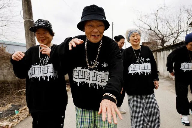 Park Jeom-sun, 81, the leader of the granny rap group “Suni and Seven Princesses”, along with members Hong Sun-yeon, 79, and Jeong Du-i, 90, raps on the street in Chilgok, South Korea, on February 6, 2024. (Photo by Kim Soo-hyeon/Reuters)